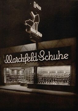 Meidlinger Hauptstraße 32, Portalgestaltung für Marchfeld Schuhe von Leopold Liebl, 1932